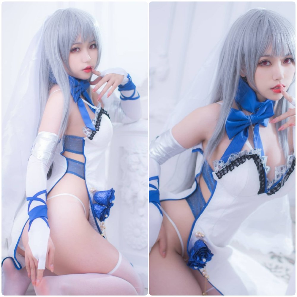 芋圆侑子身穿粉色女仆装，手拿托盘，表情羞涩可爱的高清写真